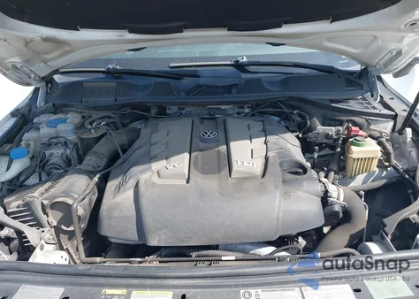 2013 Volkswagen Touareg Tdi Lux z USA, uszkodzony, nr VIN WVGEP9BP7DD006100